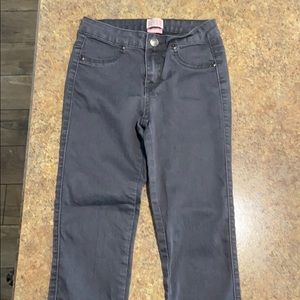 A grey pair of Canyon River Blues jeggings